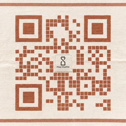 muy mucho code woven into a second throw