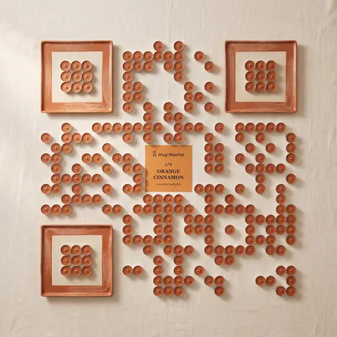 muy mucho code made of cinnamon tealights